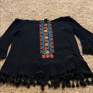 off the shoulder top with tassel bottom